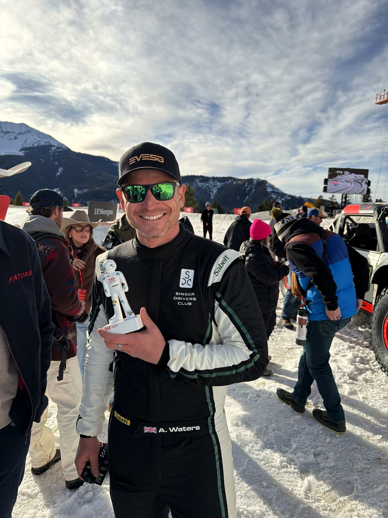 Alex Waters with an ice race trophy at Big Sky