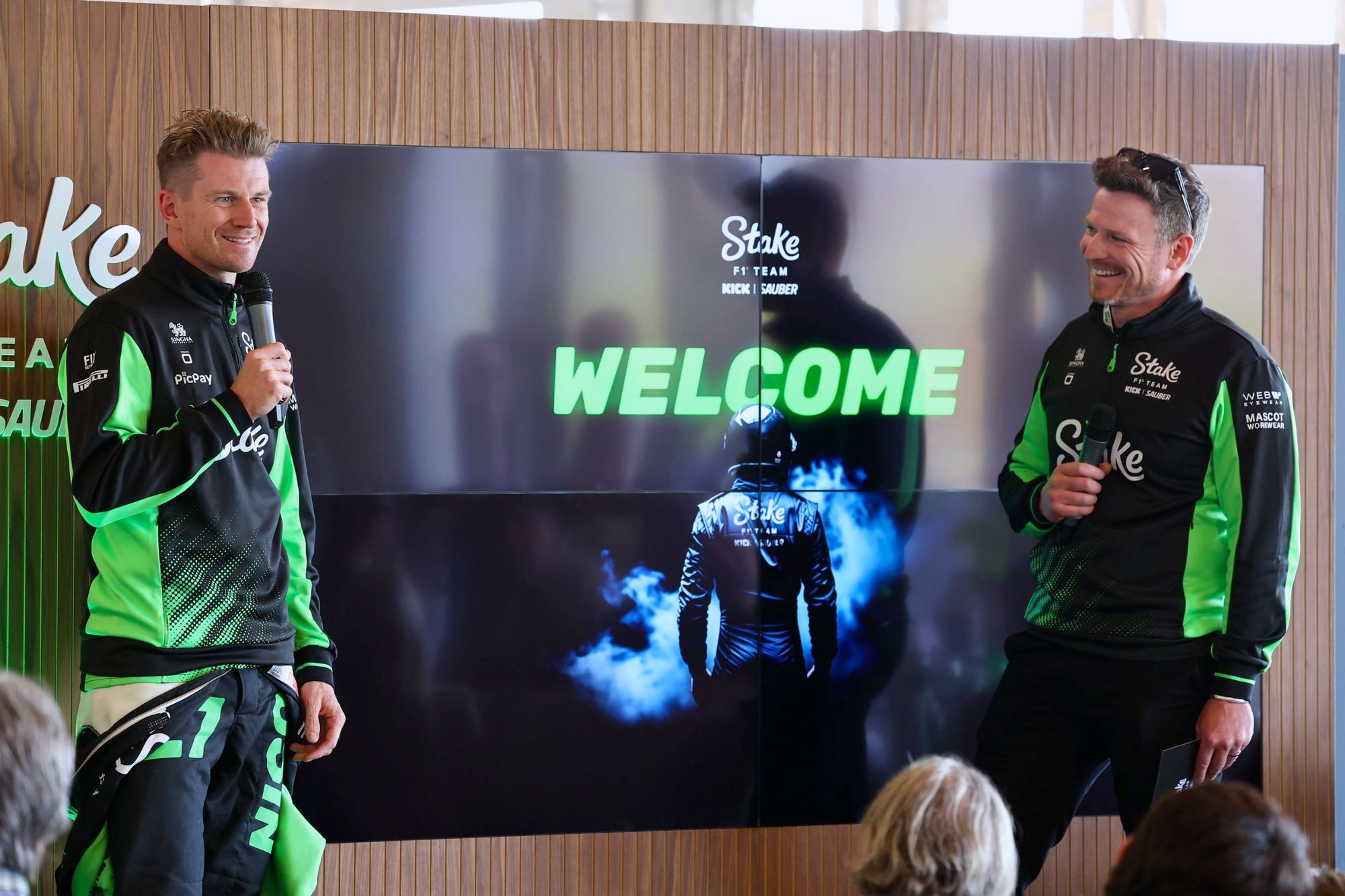 Alex Waters hosting on stage with Nico Hulkenberg
